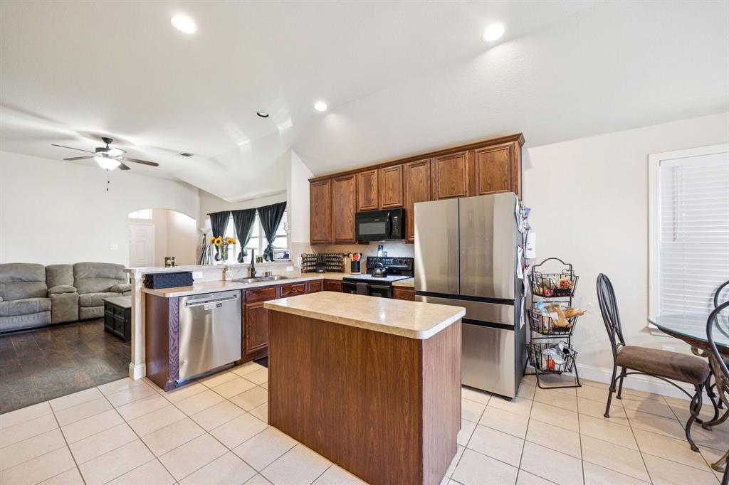 1601 Applegate Way Royse City, TX 75189 - Photo 8 of 28 a kitchen with a cabinets and chairs