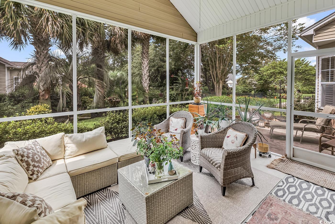 9 Saltwind Loop Murrells Inlet, SC 29576 - Photo 21 of 38 Sunroom featuring an outdoor living space and vaulted ceiling