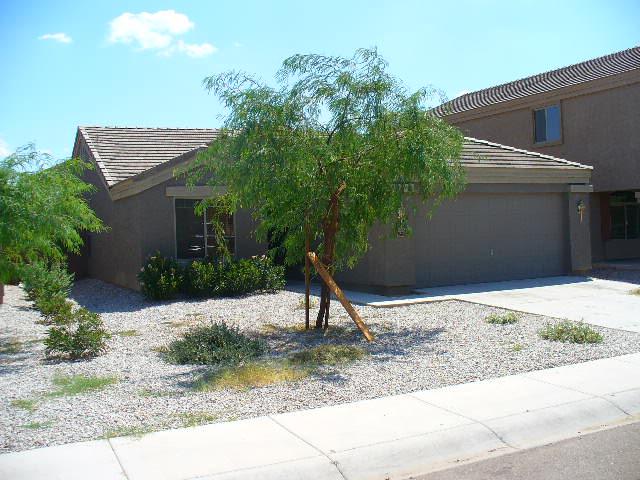 8629 West Payson Road Tolleson, AZ 85353 - Photo 1 of 13 FRONT OF YOUR NEW HOUSE