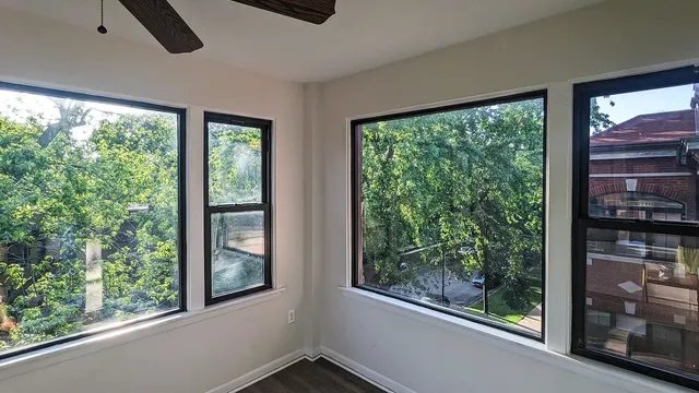 a view of a room with a large window