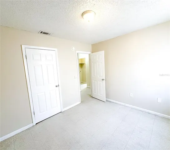 an empty room with a natural light