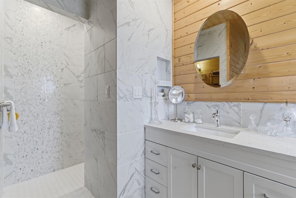 118 Heath Street Hico, TX 76457 - Photo 27 of 39 a bathroom with a sink and a mirror