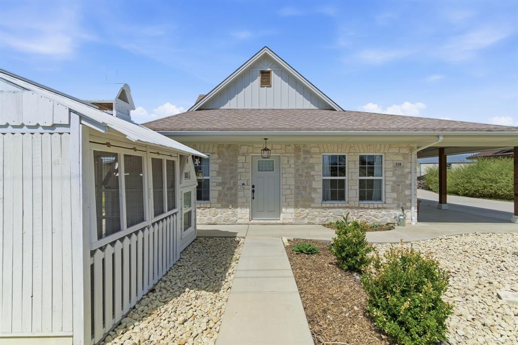 118 Heath Street Hico, TX 76457 - Photo 35 of 39 a front view of a house with garden