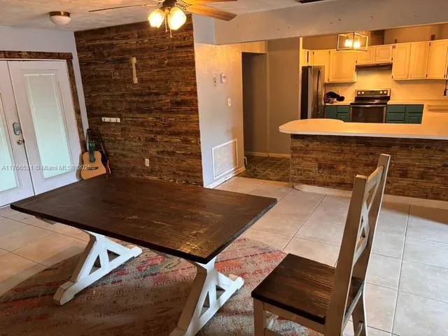 a view of a livingroom with a staircase