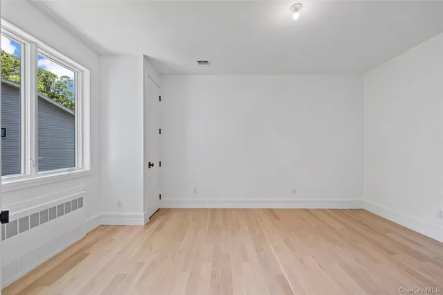 an empty room with a window