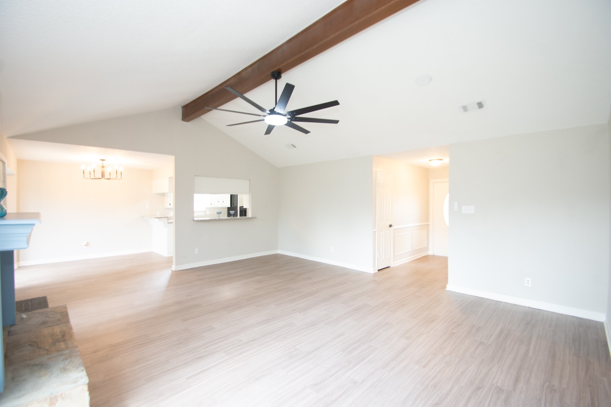 29019 Stapleford Street Spring, TX 77386 - Photo 5 of 27 an empty room with wooden floor and windows