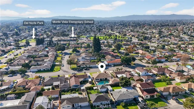 an aerial view of residential house with outdoor space