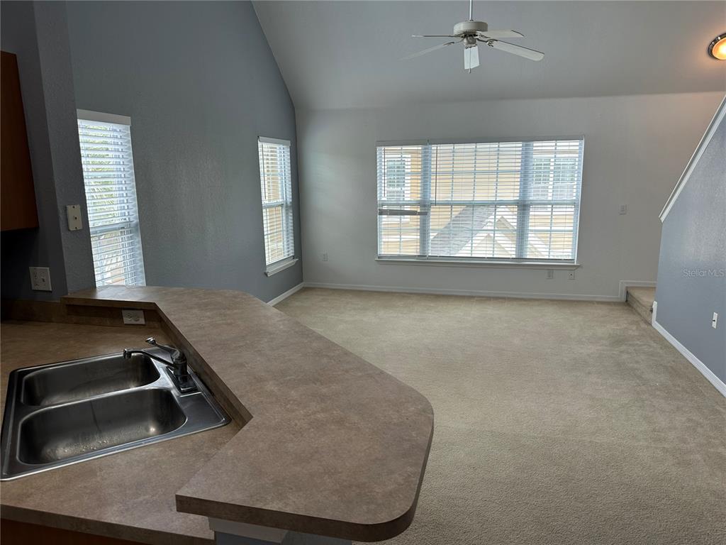 5601 Rosehill Road, Unit 201 Sarasota, FL 34233 - Photo 19 of 21 an empty room with windows