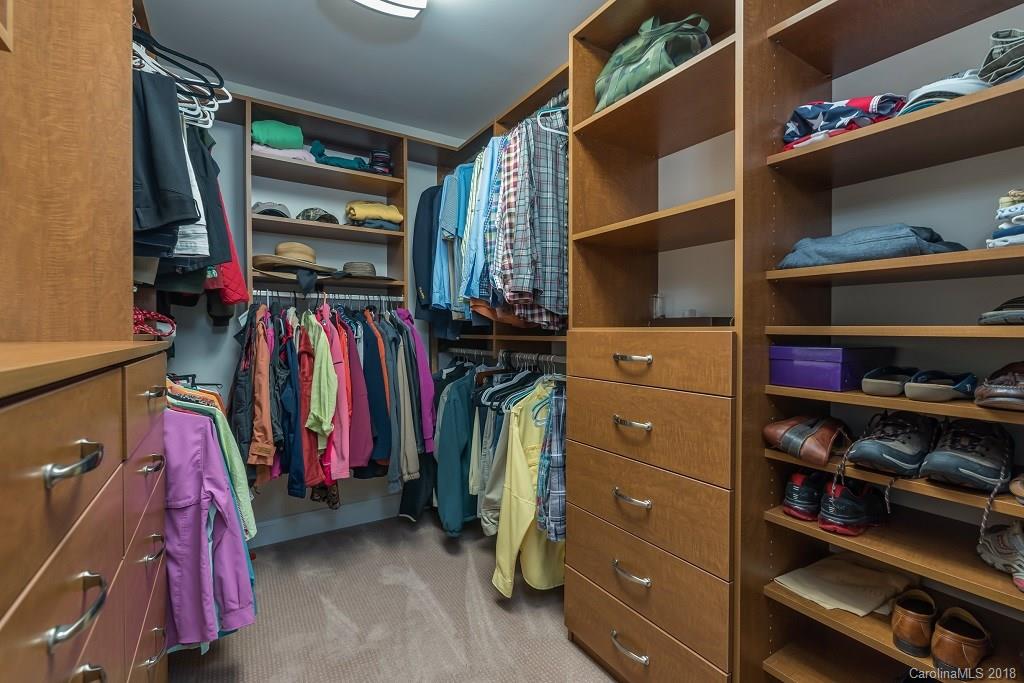 44 Jervey Road, Unit 3B Tryon, NC 28782 - Photo 19 of 29 a view of walk in closet with clothes and shoes