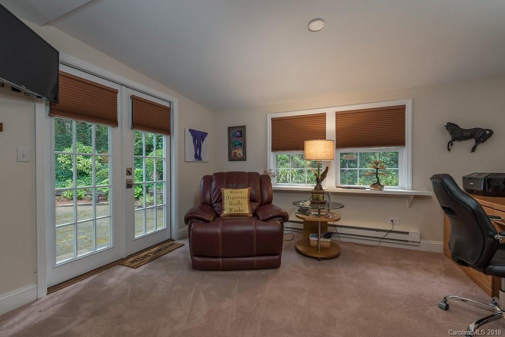 44 Jervey Road, Unit 3B Tryon, NC 28782 - Photo 20 of 29 a living room with furniture and a window