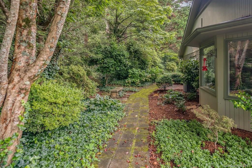 44 Jervey Road, Unit 3B Tryon, NC 28782 - Photo 23 of 29 a pathway of a house with a yard