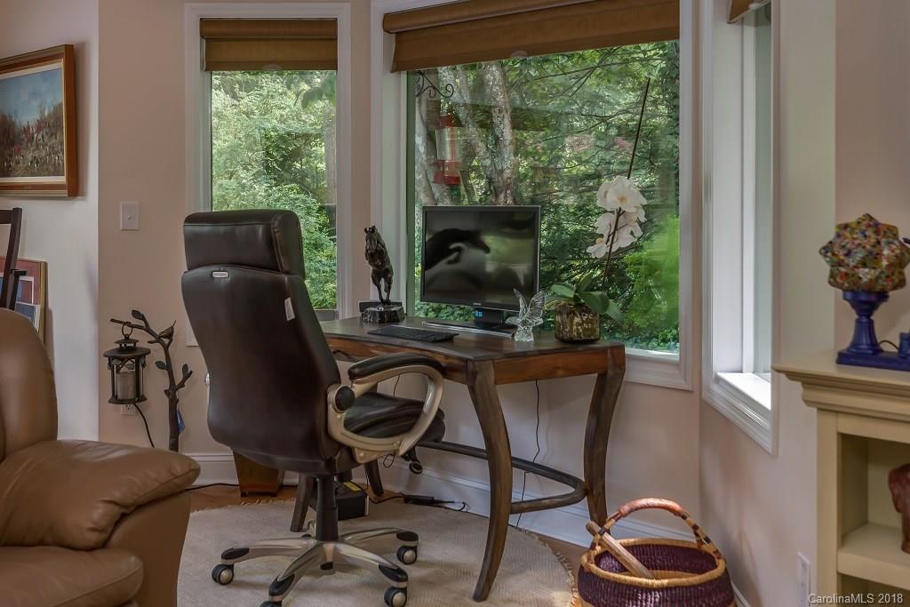 44 Jervey Road, Unit 3B Tryon, NC 28782 - Photo 8 of 29 a view of a workspace with furniture and a window