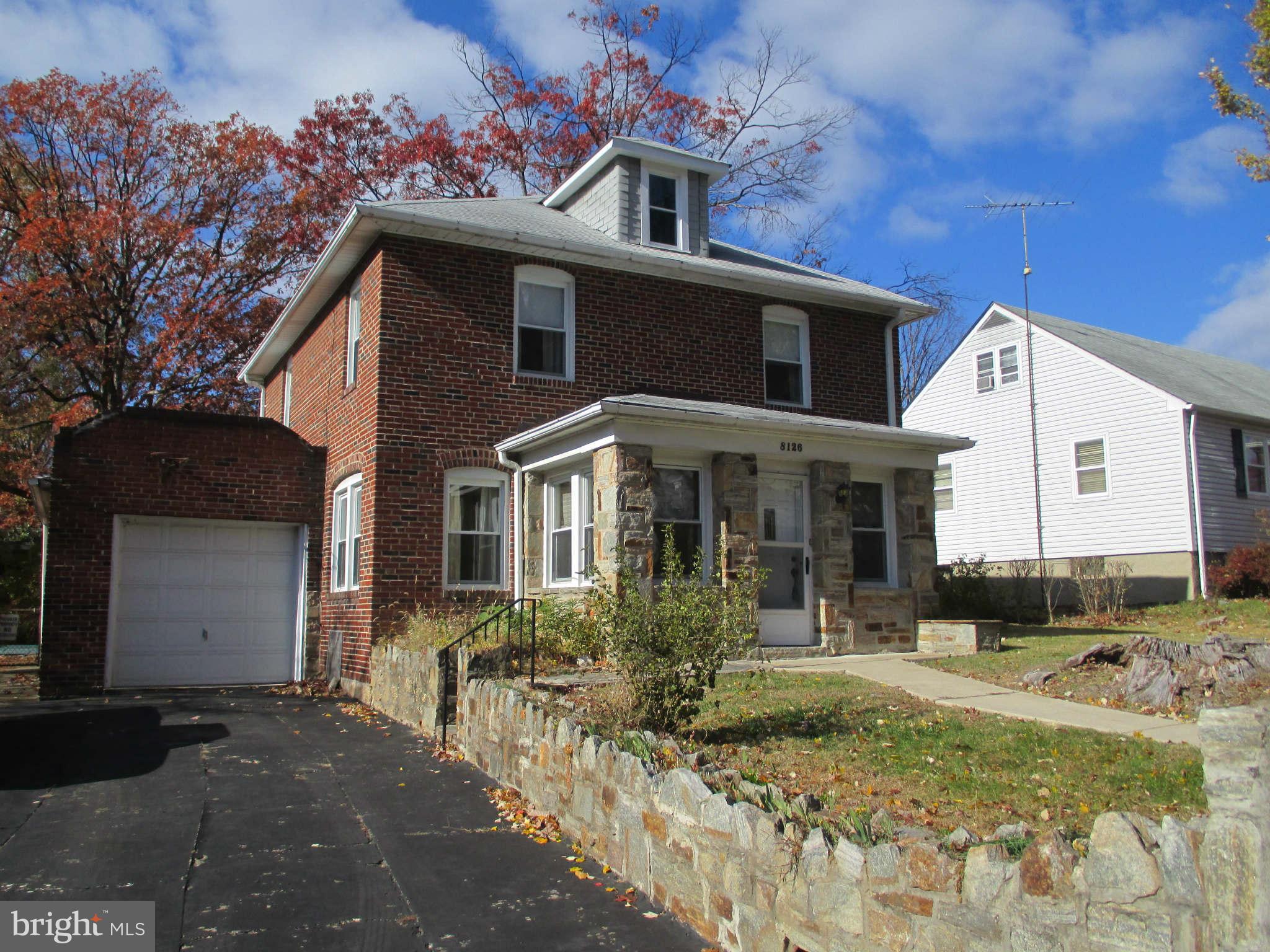 8126 Bon Air Road Baltimore, MD 21234 - Photo 2 of 28 a front view of a house with garden