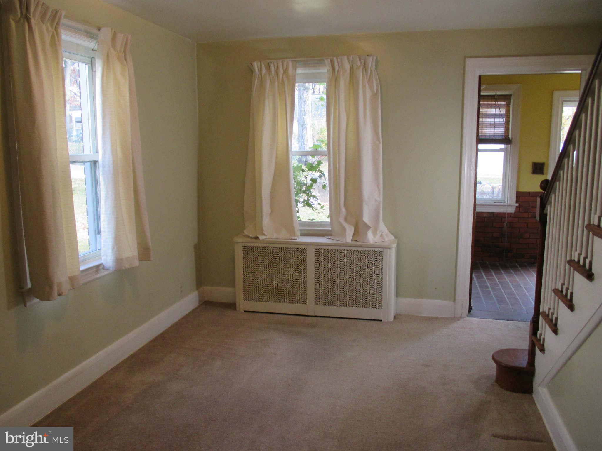 8126 Bon Air Road Baltimore, MD 21234 - Photo 6 of 28 a view of an empty room with a window