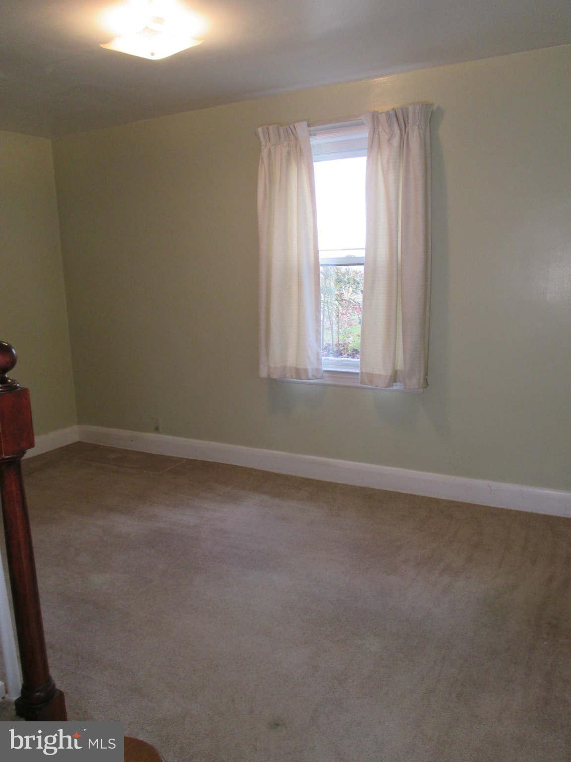 8126 Bon Air Road Baltimore, MD 21234 - Photo 7 of 28 an empty room with a window