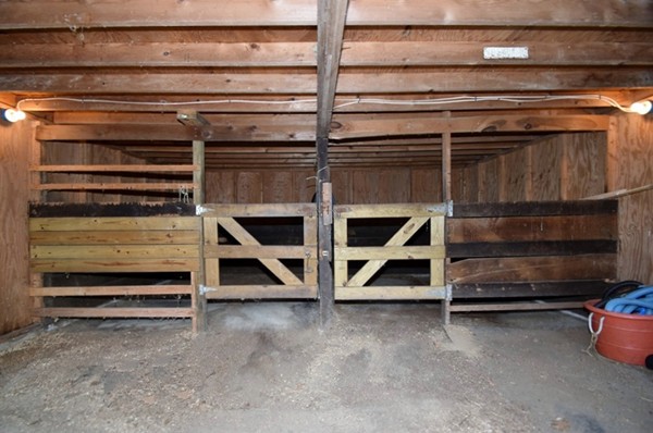 107 New Braintree Road Oakham, MA 01068 - Photo 20 of 22 a view of an empty room with a staircase