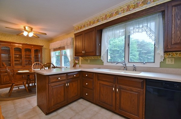 107 New Braintree Road Oakham, MA 01068 - Photo 3 of 22 a kitchen with a sink and large window