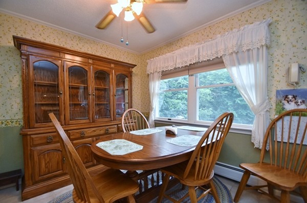 107 New Braintree Road Oakham, MA 01068 - Photo 4 of 22 a view of a dining room with furniture window and outside view