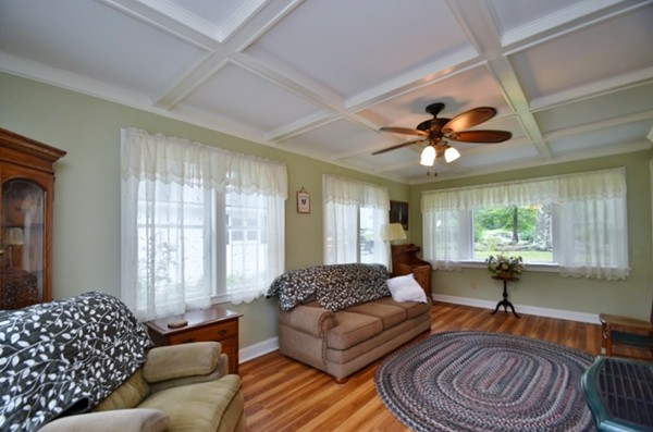 107 New Braintree Road Oakham, MA 01068 - Photo 7 of 22 a living room with furniture and a large window