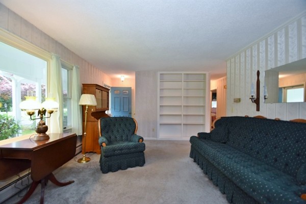 107 New Braintree Road Oakham, MA 01068 - Photo 10 of 22 a living room with furniture and a large window