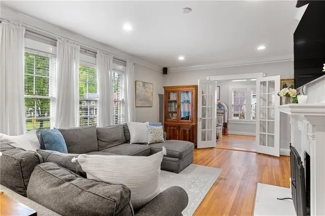 a bathroom with a toilet a sink and a mirror