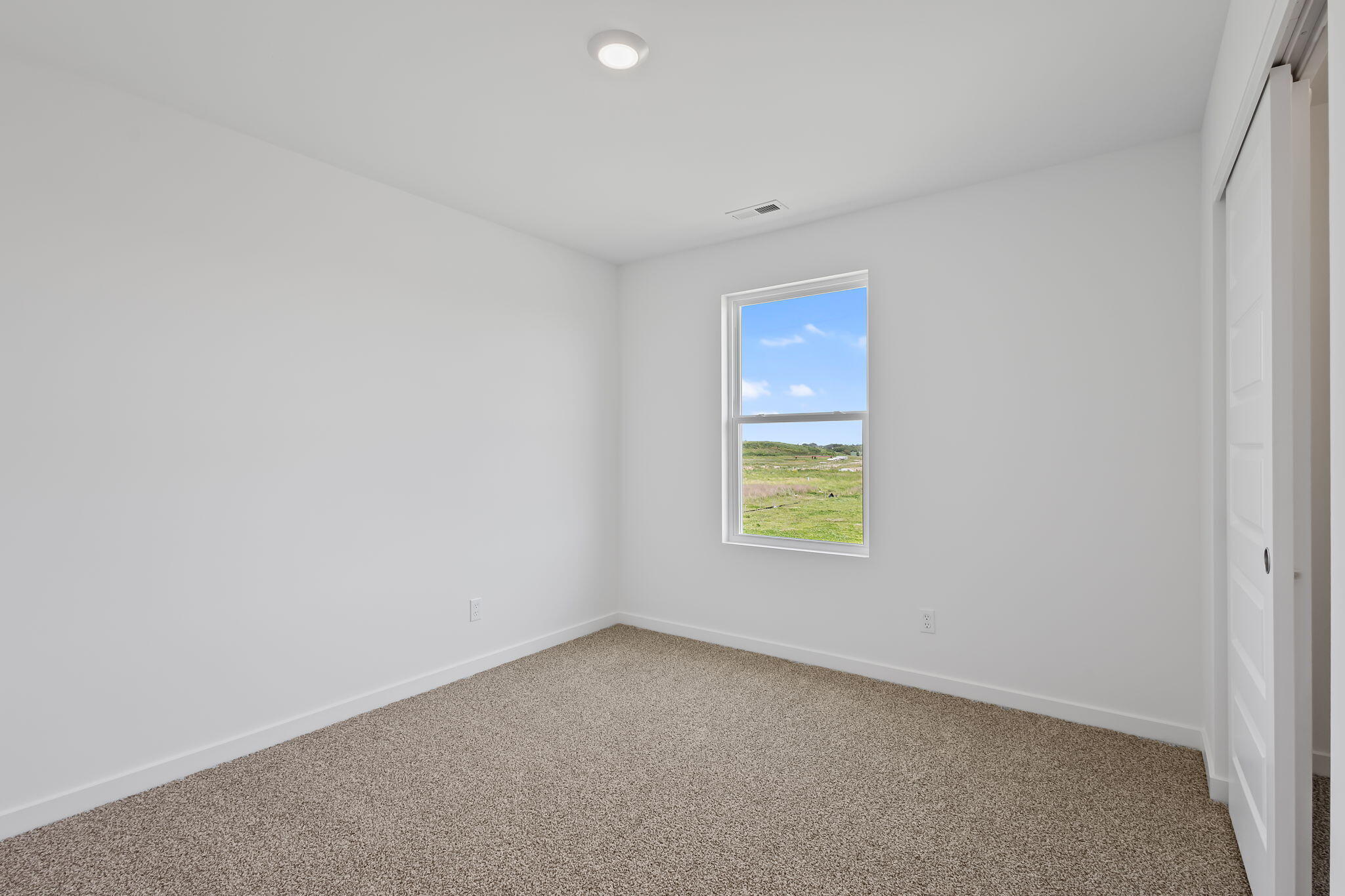 10669 Blaine Street Crown Point, IN 46307 - Photo 27 of 27 a view of an empty room with a window