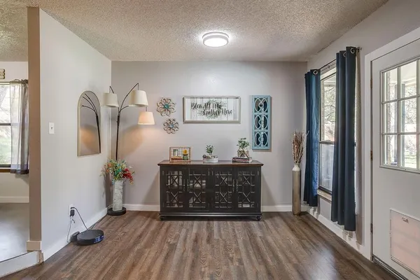 a view of a livingroom with furniture and window
