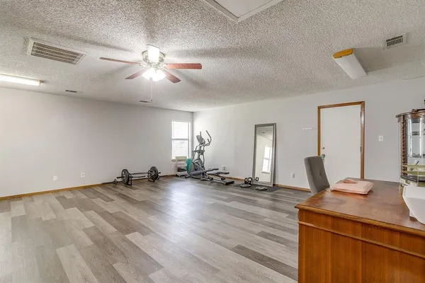 a view of an empty room and window