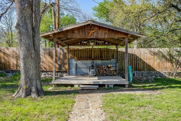 a view of yard and swimming pool