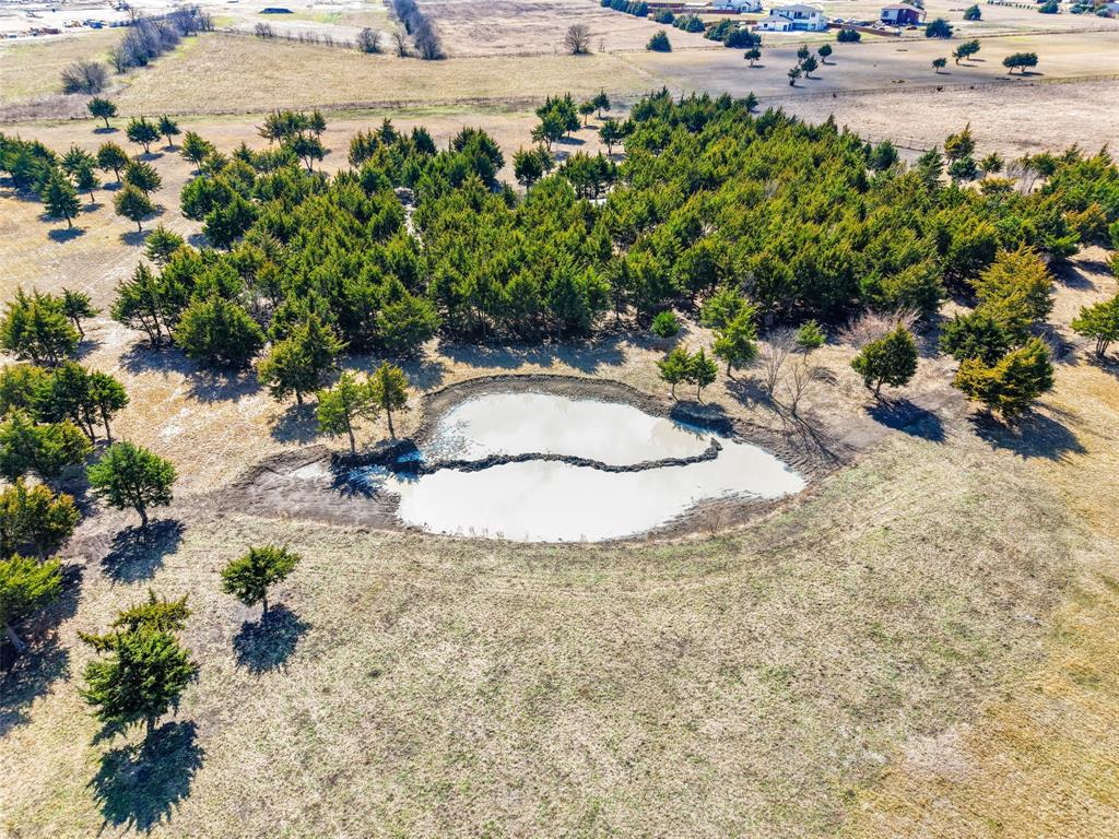 710 East Reindeer Road Lancaster, TX 75146 - Photo 18 of 23 a view of a backyard of the house