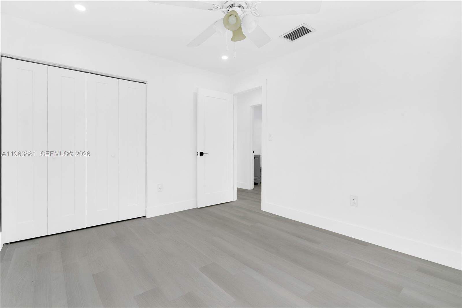 29822 Southwest 149th Avenue Homestead, FL 33033 - Photo 13 of 17 a view of an empty room