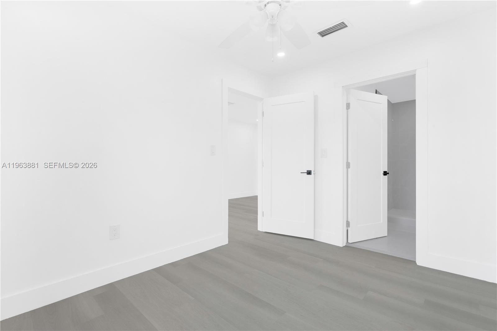29822 Southwest 149th Avenue Homestead, FL 33033 - Photo 9 of 17 a view of an empty room