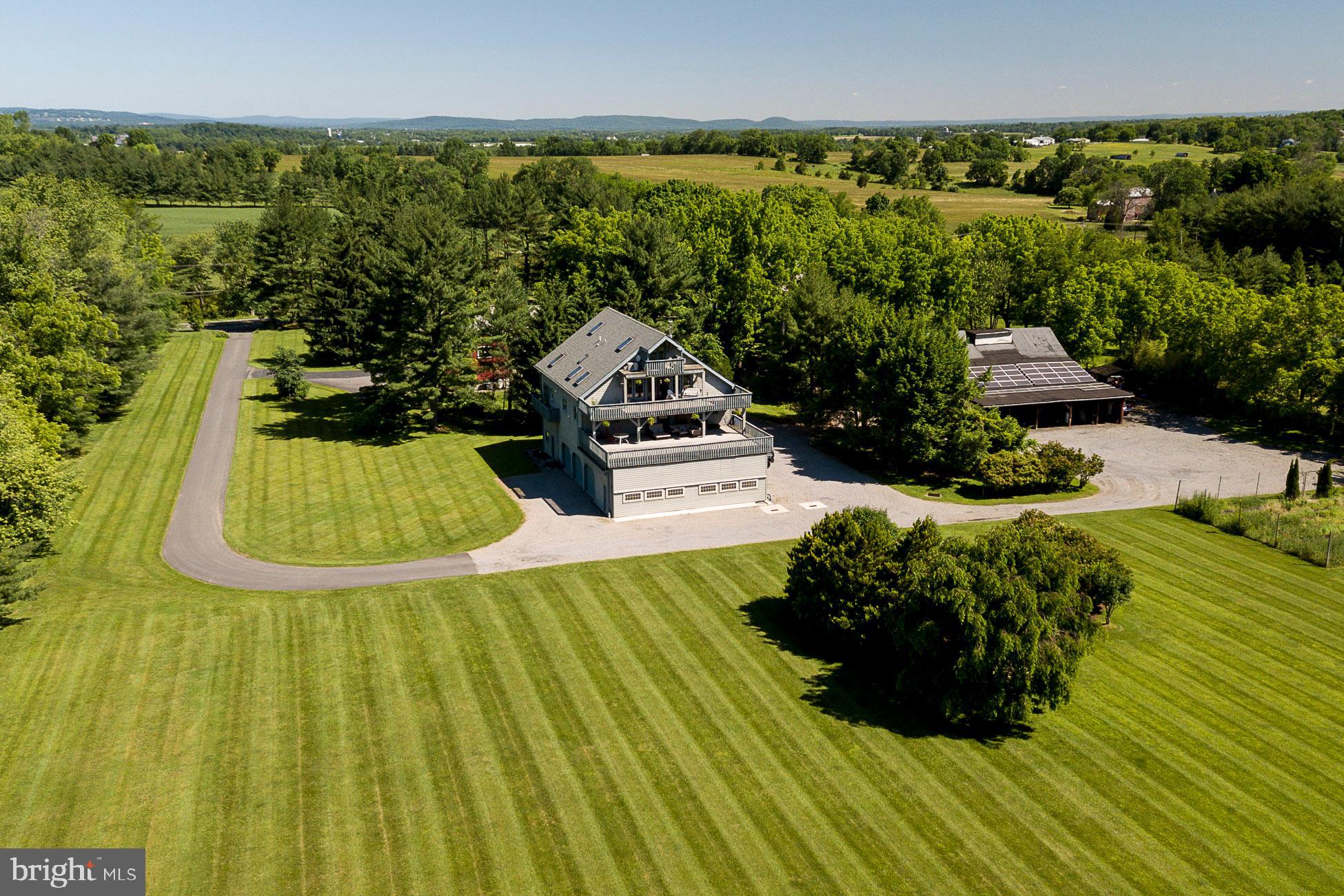 258-260 Wertsville Road Ringoes, NJ 08551 - Photo 28 of 32 Drone shot of the apartment accessory building