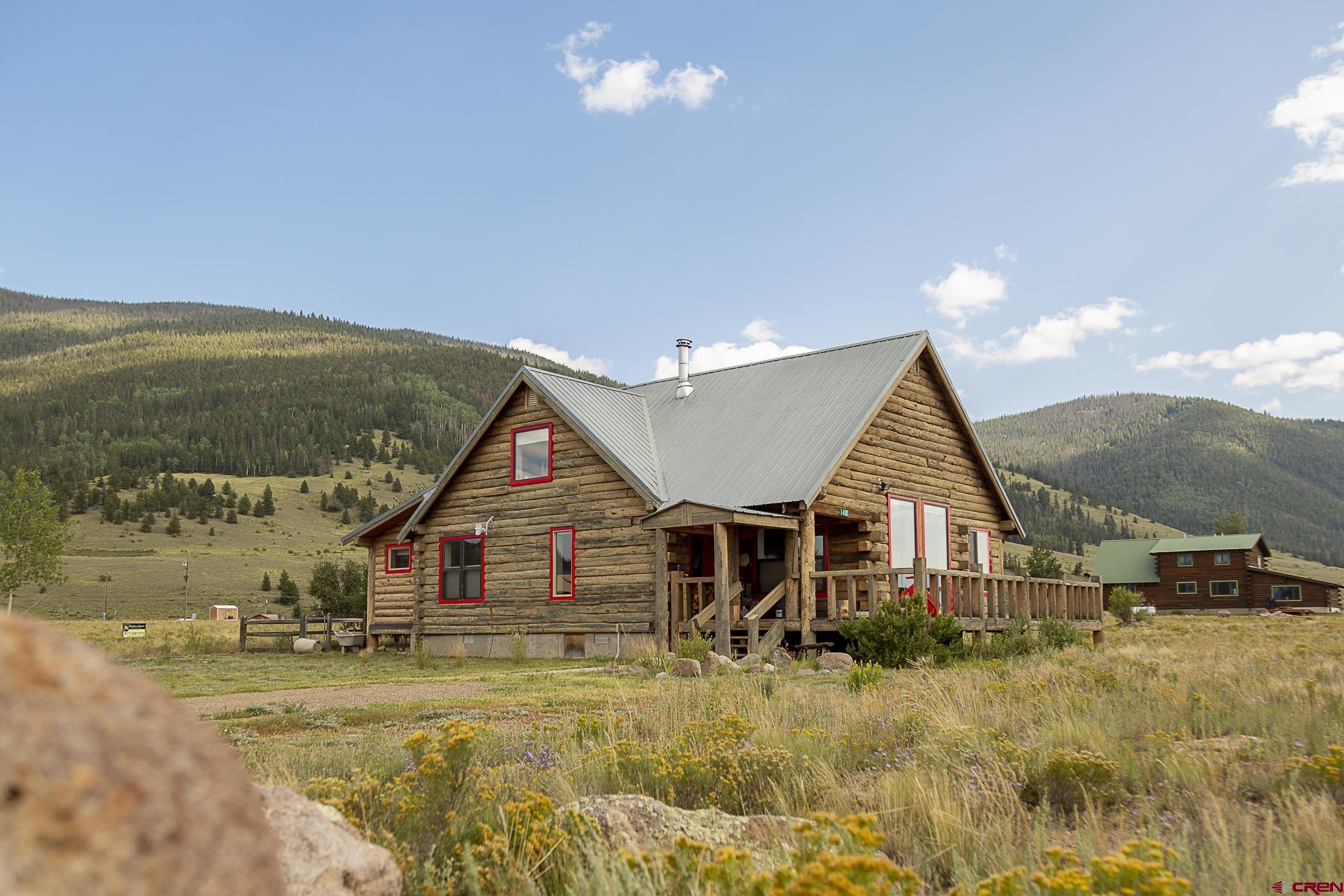 148 Rio Grande Drive Creede, CO 81130 - Photo 1 of 27 a view of a house with a yard