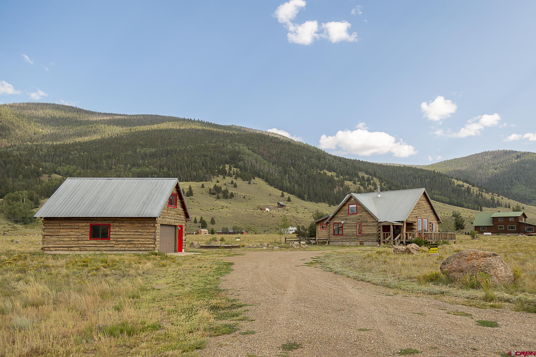 148 Rio Grande Drive Creede, CO 81130 - Photo 2 of 27 a view of a house with a yard