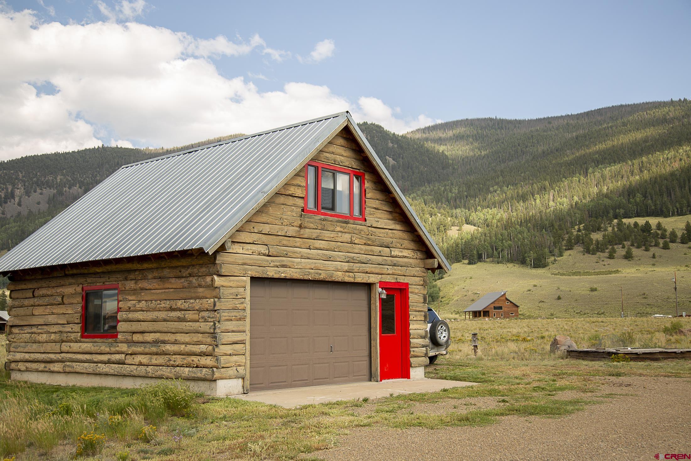 148 Rio Grande Drive Creede, CO 81130 - Photo 21 of 27 a view of a house with a terrace
