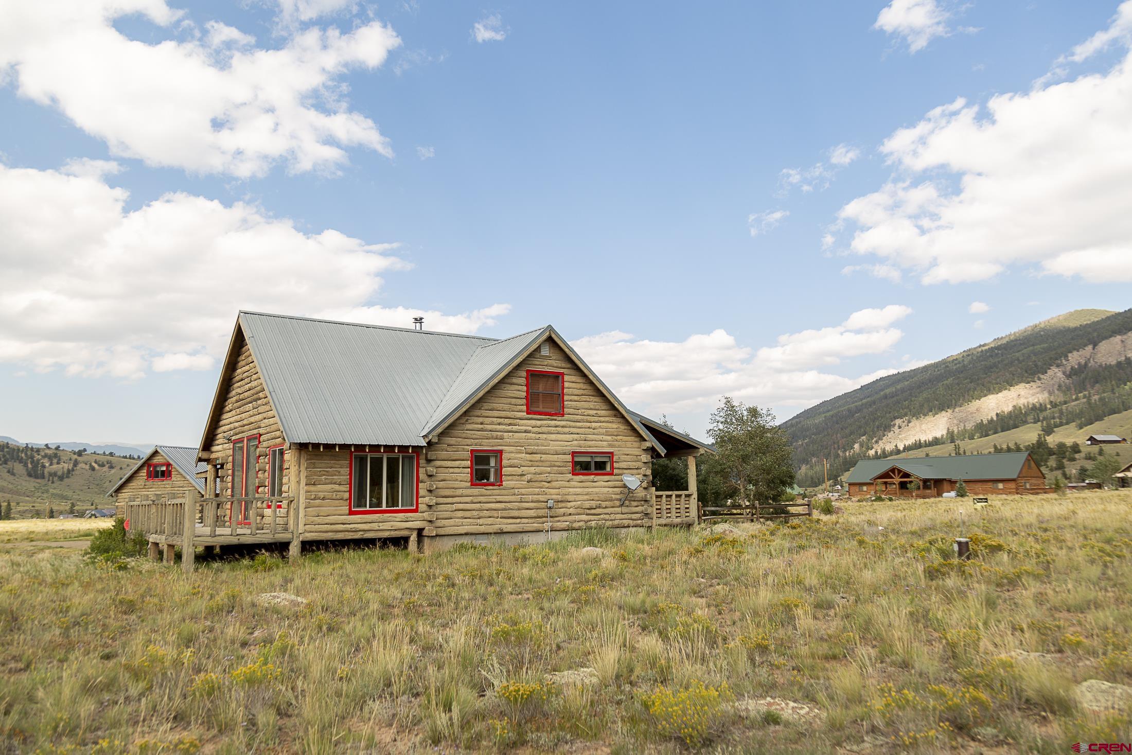 148 Rio Grande Drive Creede, CO 81130 - Photo 25 of 27 a view of a house with wooden fence