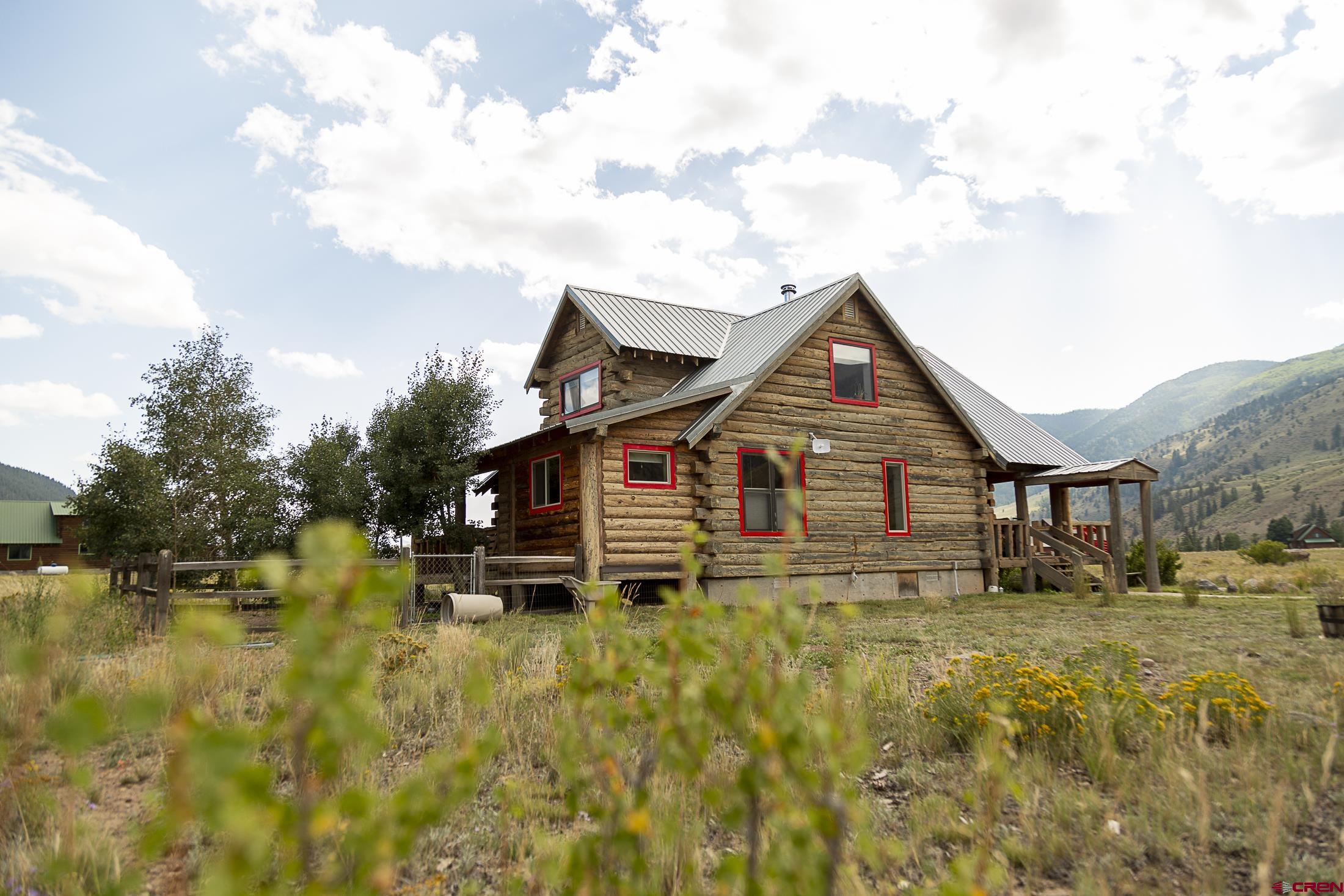 148 Rio Grande Drive Creede, CO 81130 - Photo 26 of 27 a front view of house with yard green space