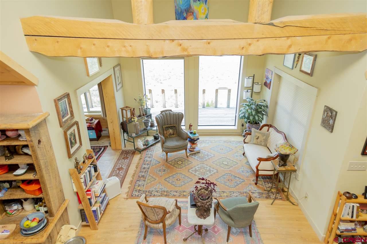 148 Rio Grande Drive Creede, CO 81130 - Photo 4 of 27 a view of a livingroom with furniture and a window