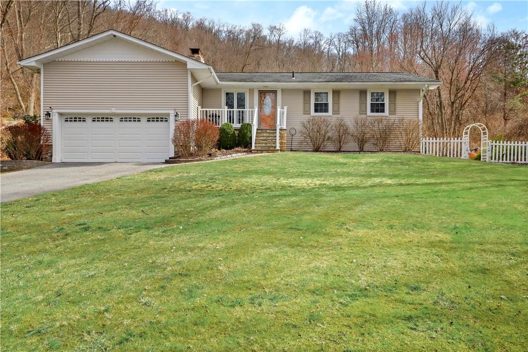 748 East Branch Road Patterson, NY 12563 - Photo 1 of 1 a front view of a house with garden