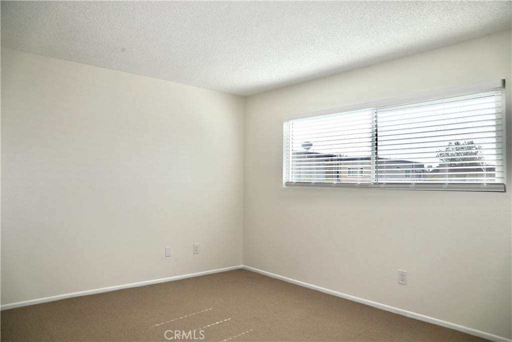 16702 Blanton Lane Huntington Beach, CA 92649 - Photo 9 of 19 an empty room with a window