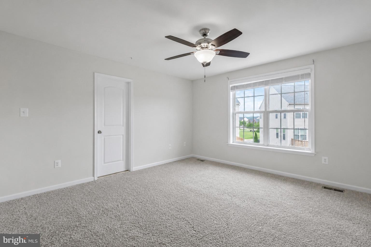 4731 Cambria Road Frederick, MD 21703 - Photo 33 of 63 a view of an empty room with a window