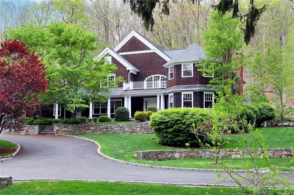112 Good Hill Road Weston, CT 06883 - Photo 1 of 1 a front view of a house with a garden
