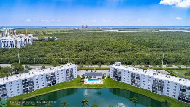 a view of a city with lawn chairs and a big yard
