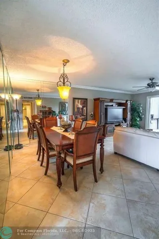a view of a dining hall with furniture