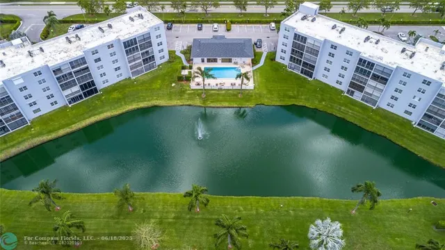 a view of a lake with a yard