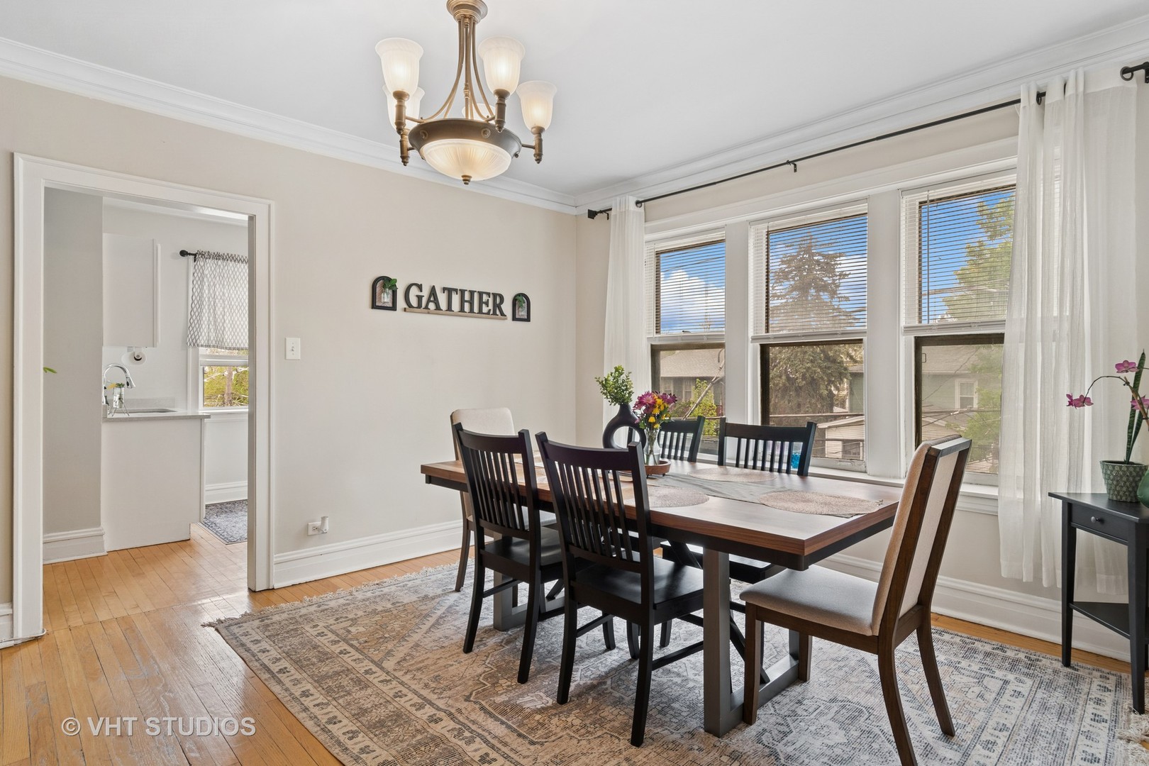 7 Fillmore Street, Unit 2 Oak Park, IL 60304 - Photo 14 of 27 a view of a dining room with furniture and wooden floor