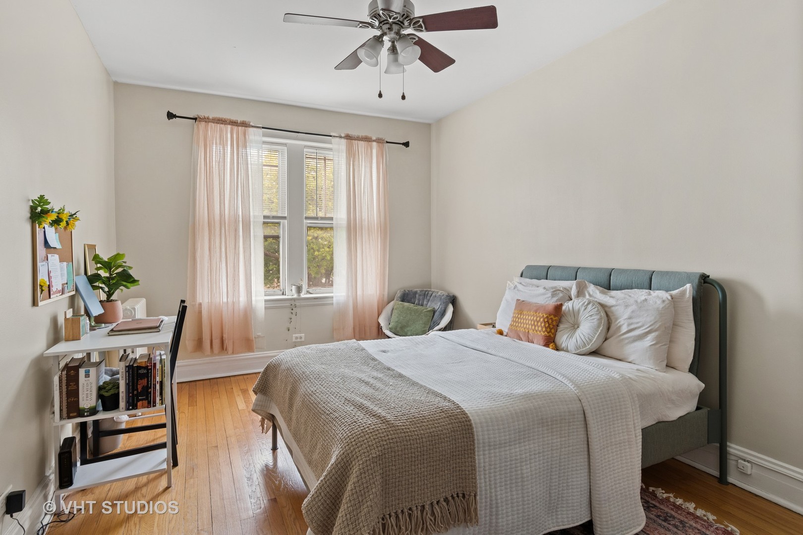 7 Fillmore Street, Unit 2 Oak Park, IL 60304 - Photo 19 of 27 a bedroom with a bed and wooden floor