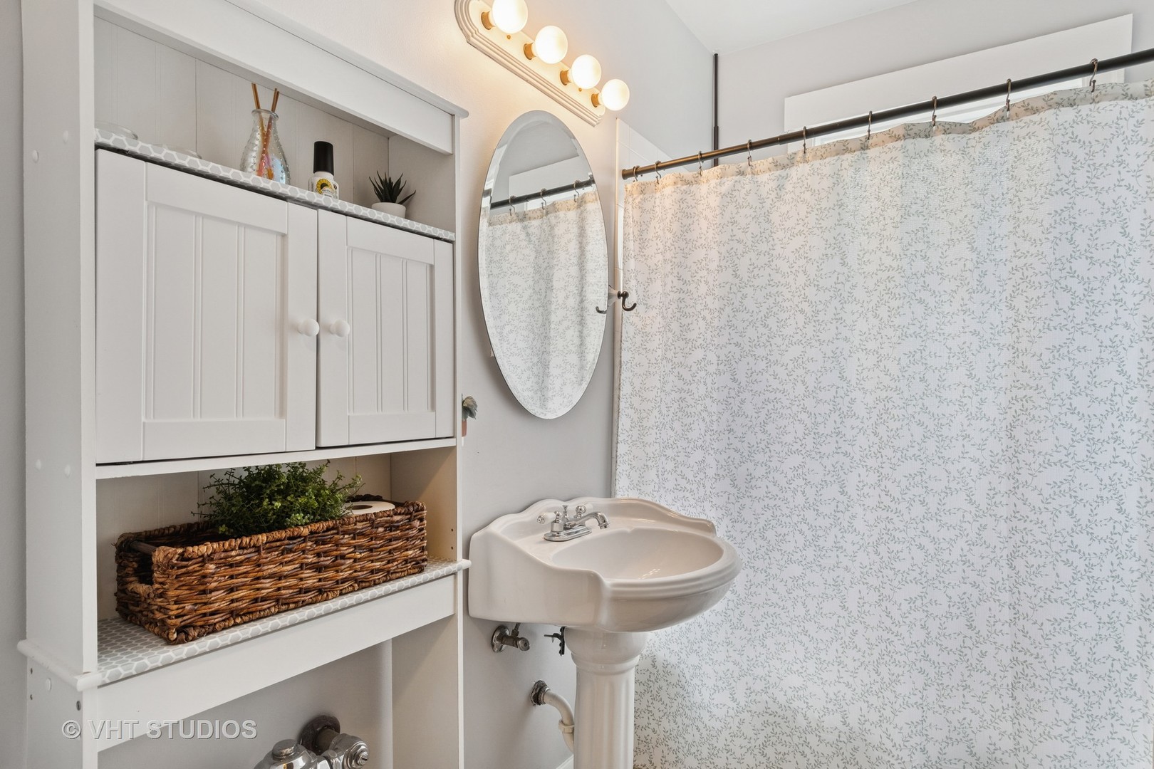7 Fillmore Street, Unit 2 Oak Park, IL 60304 - Photo 21 of 27 a bathroom with a sink a mirror and a shower