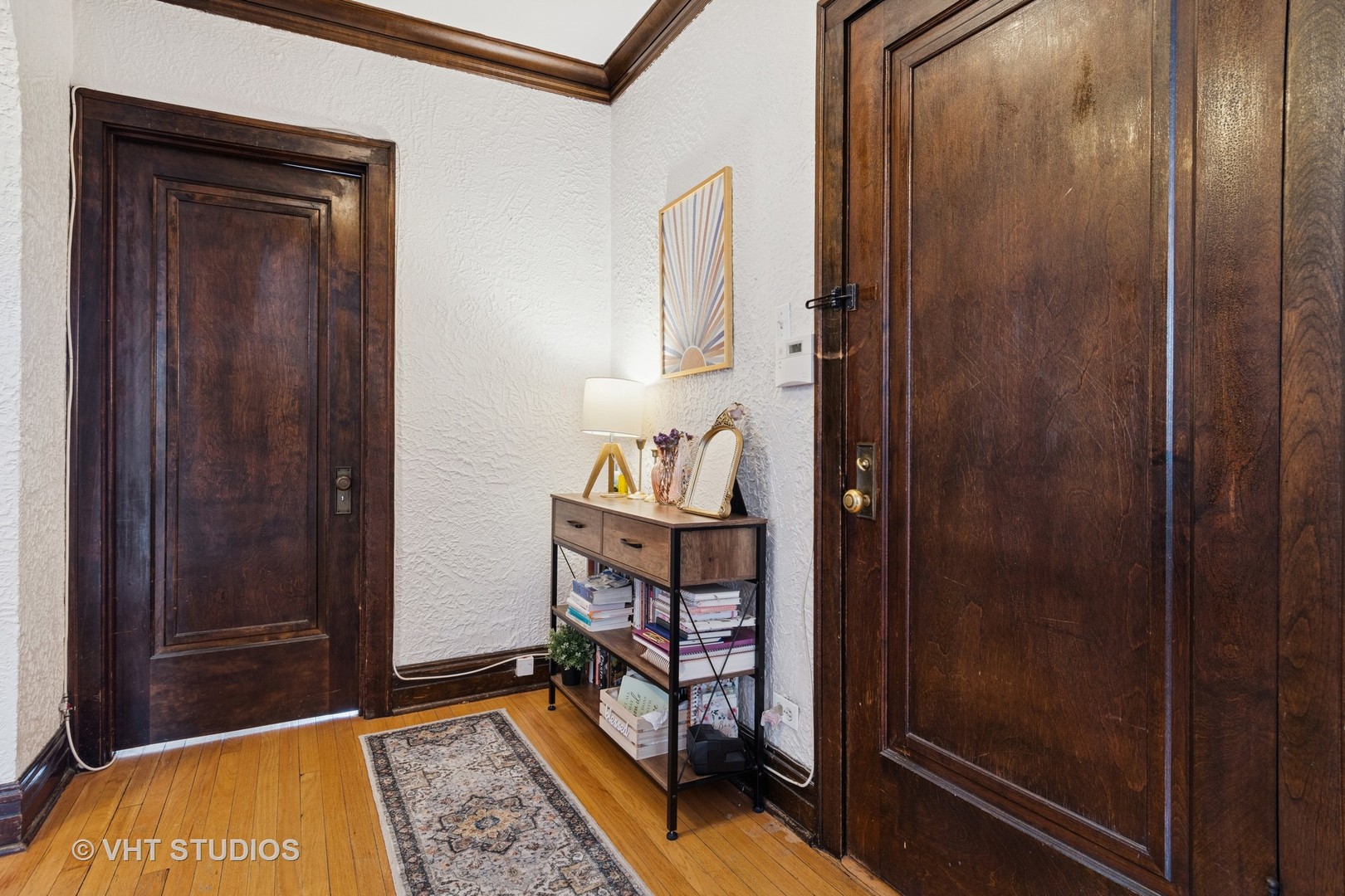 7 Fillmore Street, Unit 2 Oak Park, IL 60304 - Photo 4 of 27 a room with mirror door and furniture